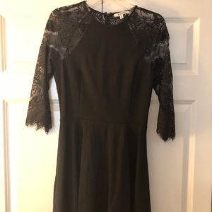 Black Fit n flare dress. Open lace back.